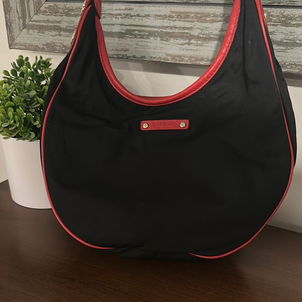 Kate Spade Black and Red Hobo Bag with Curved Silhouette
